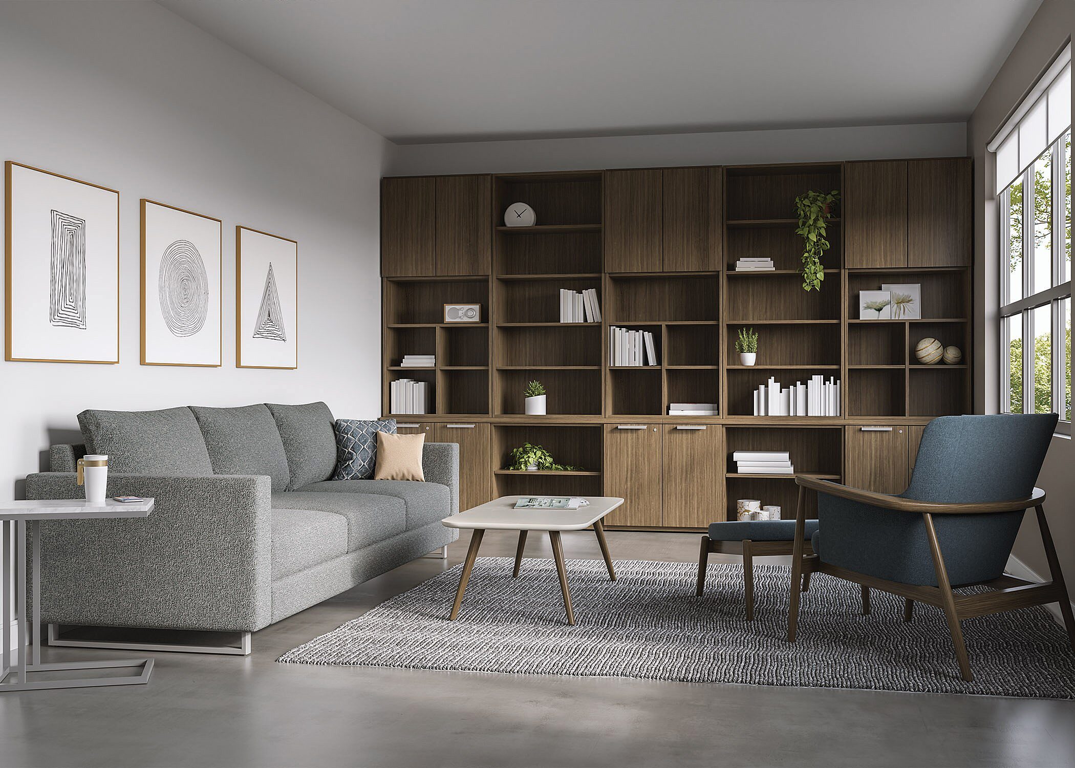 moody library with wall of storage gray sofa and blue Hobsen lounge