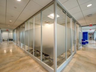 corner of glass walls with opaque strip in center